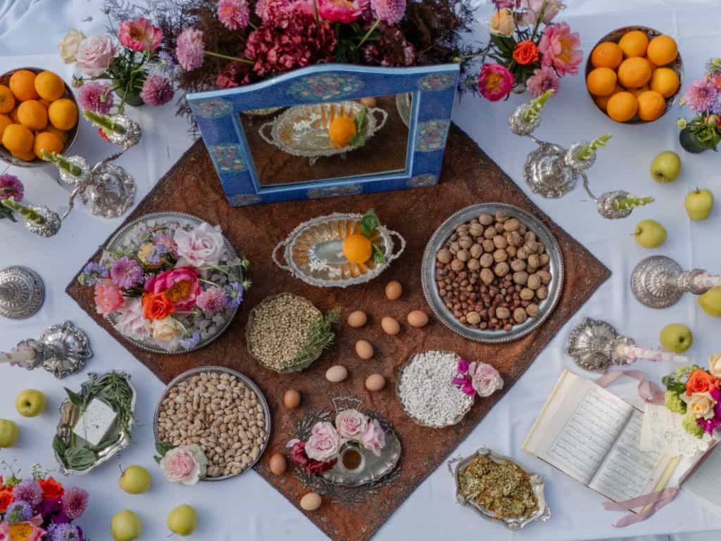 Wedding prayer panel decorated with flowers, fruit, and spices, ideal for religious ceremonies and traditional Italian weddings, creating a spiritual and celebratory atmosphere.